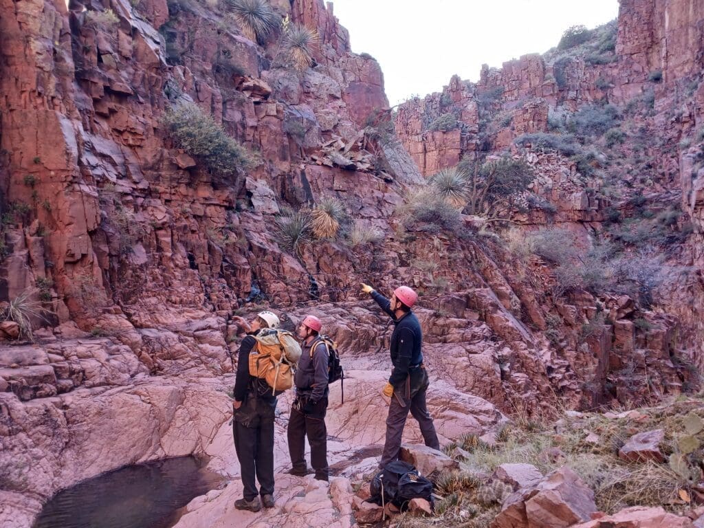 talking about the different rocks on the canyon walls